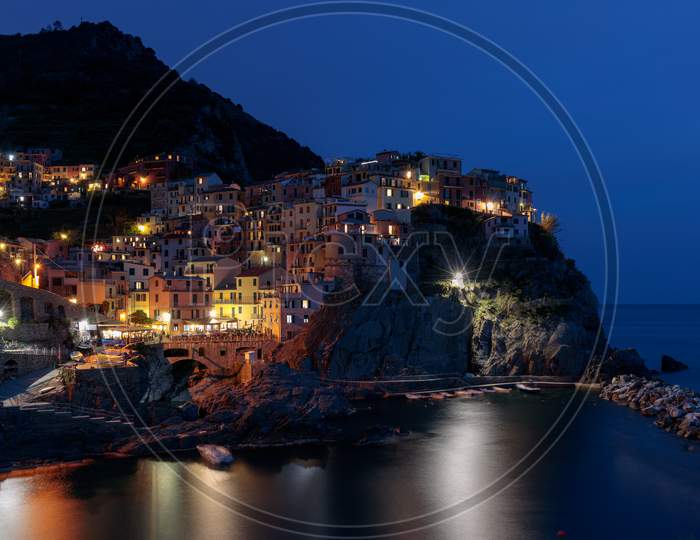 Manarola, Liguria/Italy  - April 20 : Night-Time View Of Manarola Liguria Italy On April 20, 2019