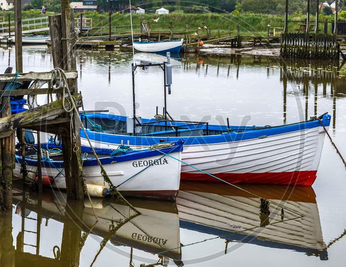 Row Of Fishing Boats In Southwold Harbour