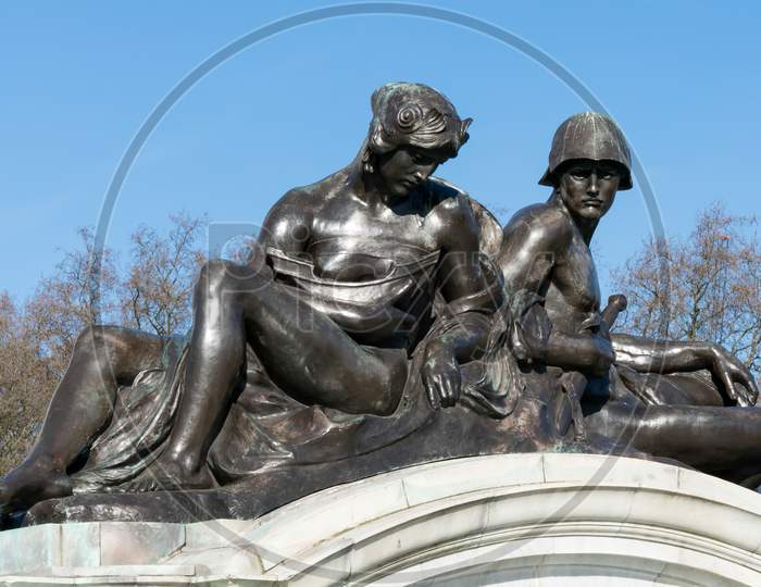 Statue On The Queen Victoria Memorial Outside Buckingham Palace In London