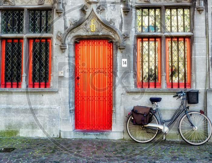 Bicycle Outside A Property In Market Square Bruges