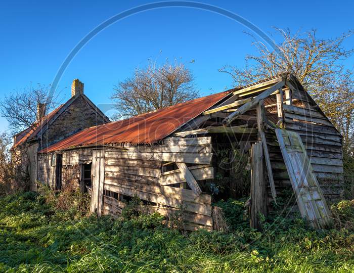 Derelict Farmhouse And Outbuildings In Cambridgeshire