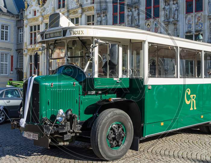 Old Bus In Market Square Bruges