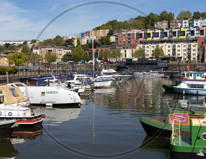 Bristol, Uk - May 14 : View Of Boats And Colourful Apartments Along The River Avon In Bristol On May 14, 2019. One Unidentified Person