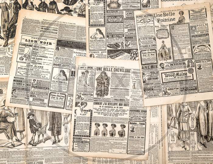 Newspaper Pages With Antique Advertising. Woman'S Fashion Magazine