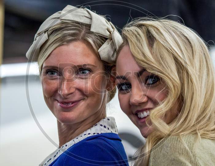Two Smiling Ladies At The Goodwood Revival