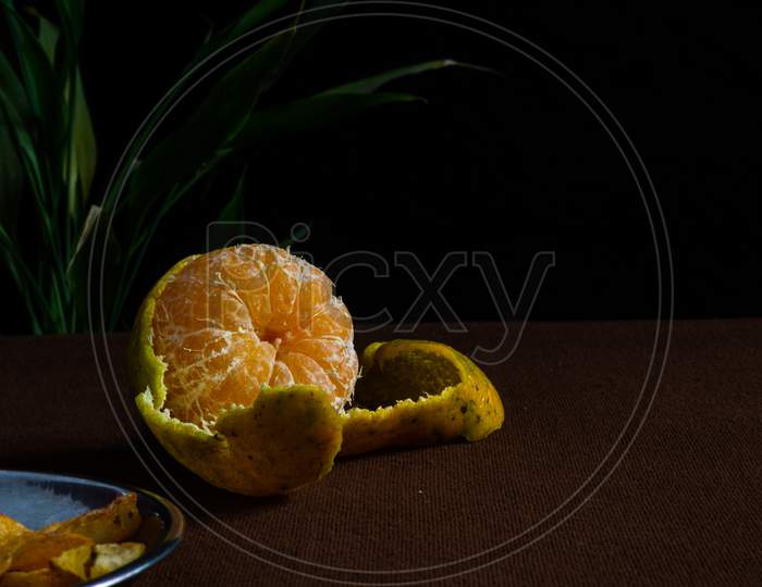 Orange Fruit Peeled And Kept On The Table
