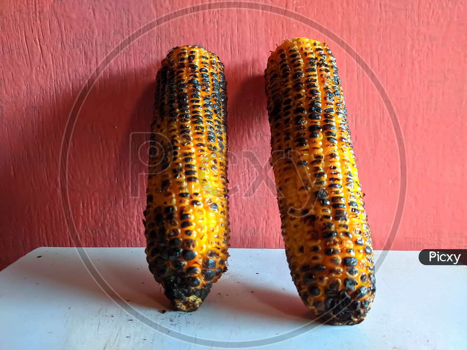 Roasted corn sweetcorn Indian village corn