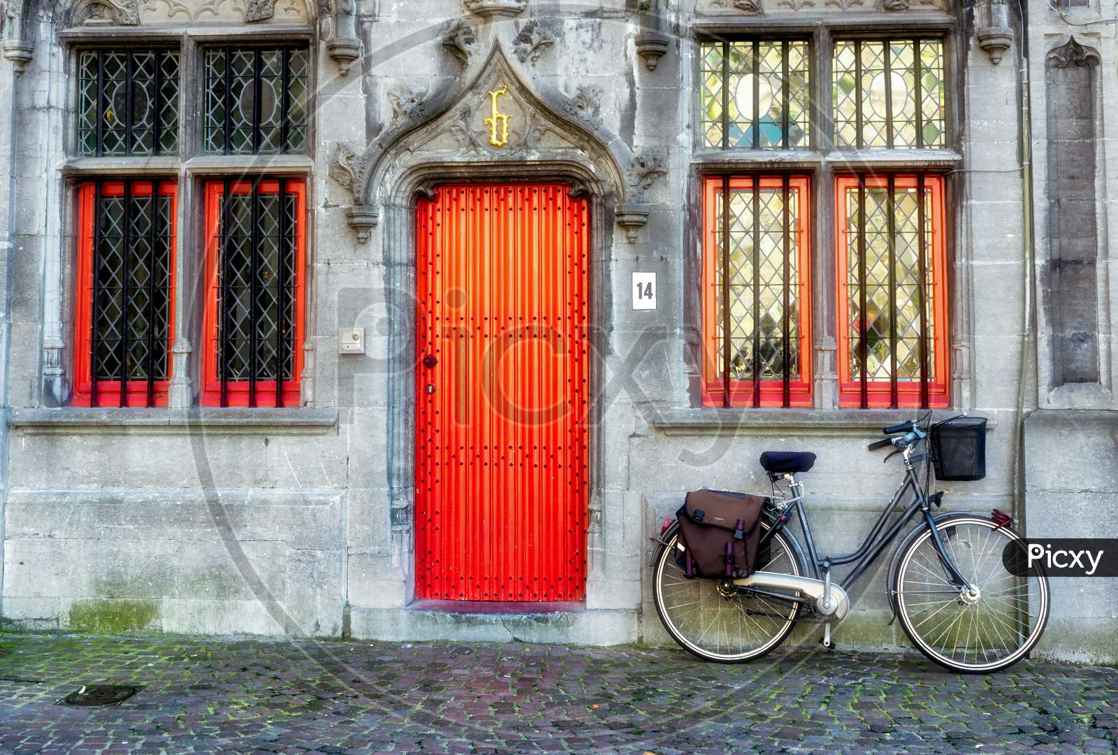 Bicycle Outside A Property In Market Square Bruges