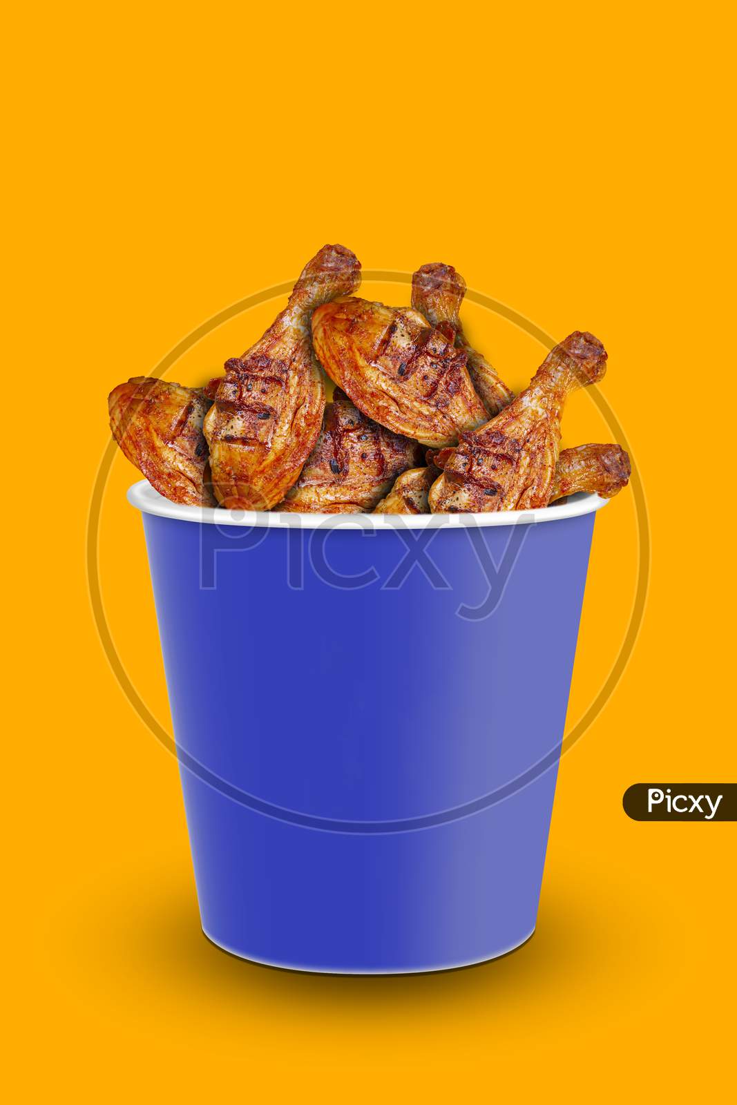 Tasty Grilled Chicken Pieces On Orange Background , Closeup. Chicken Bucket. Space For Text
