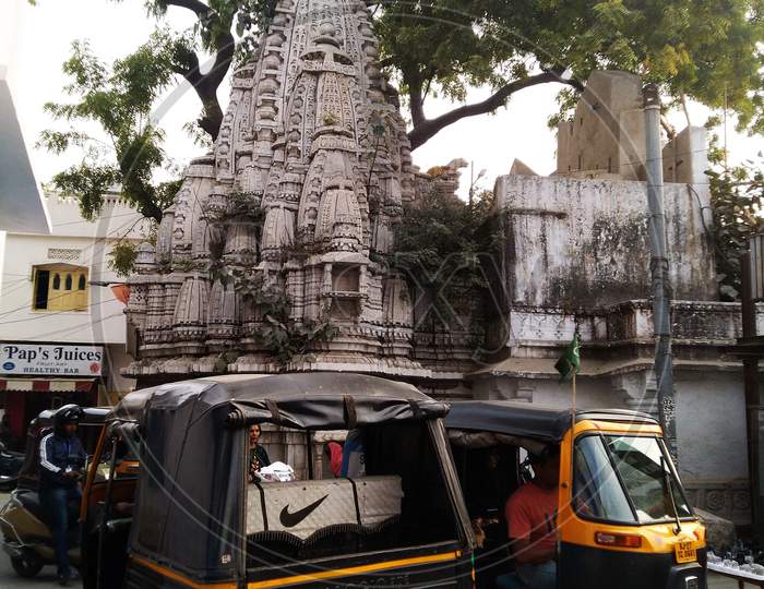 Tample on a busy road