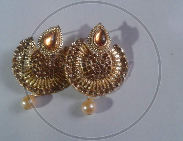 Beautiful golden earrings.