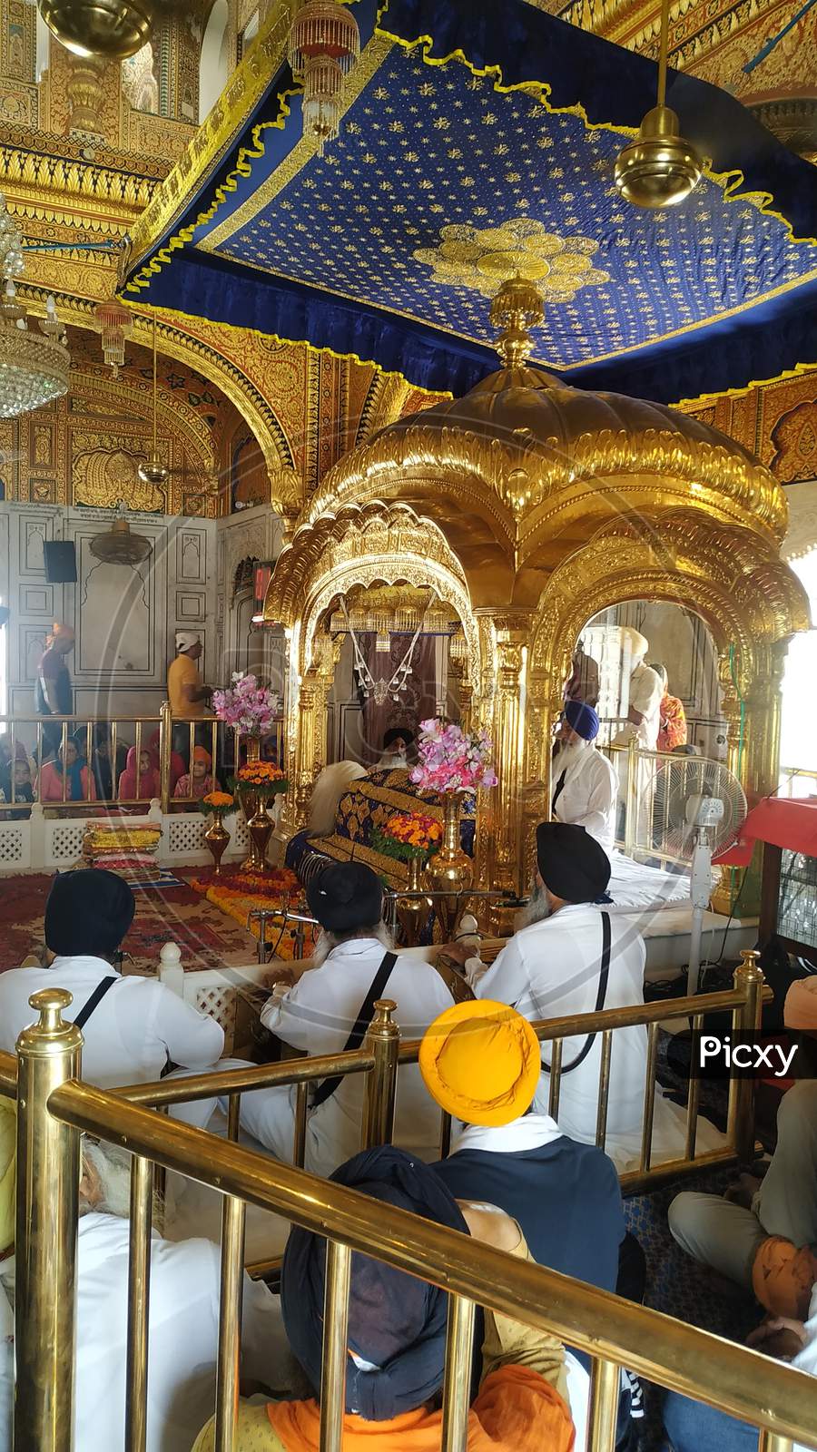 Granthis praying inside a gurudwara at Punjab