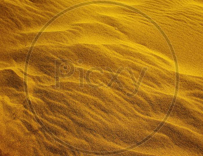 Grainy Sand And Wavy Dune