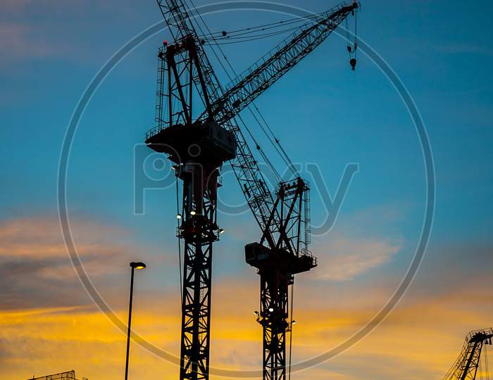 Sunset And A Crane