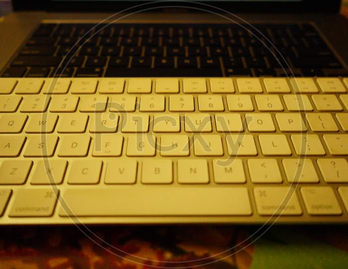 External keyboard with laptop keyboard