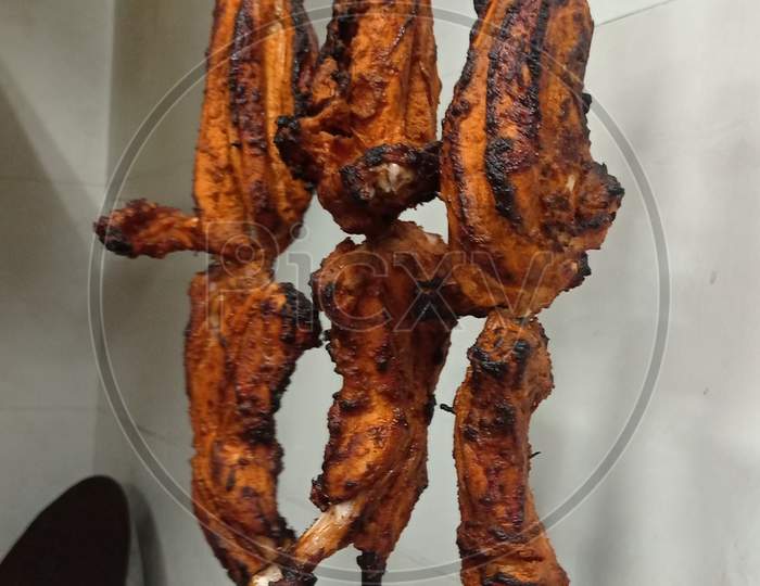 Six pieces of tandoori chicken from the north indian kitchen for dinner on the restaurant