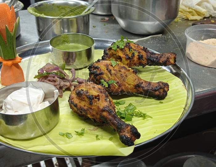 Three pieces of chicken Tangri kebab from the kitchen for dinner menu