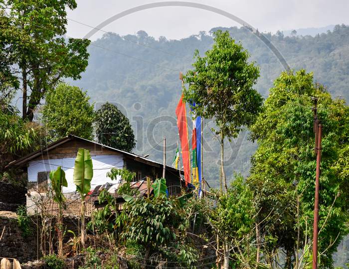 Traditional Gurkha House With Prayer Flags In Lava ,Kalimpong .