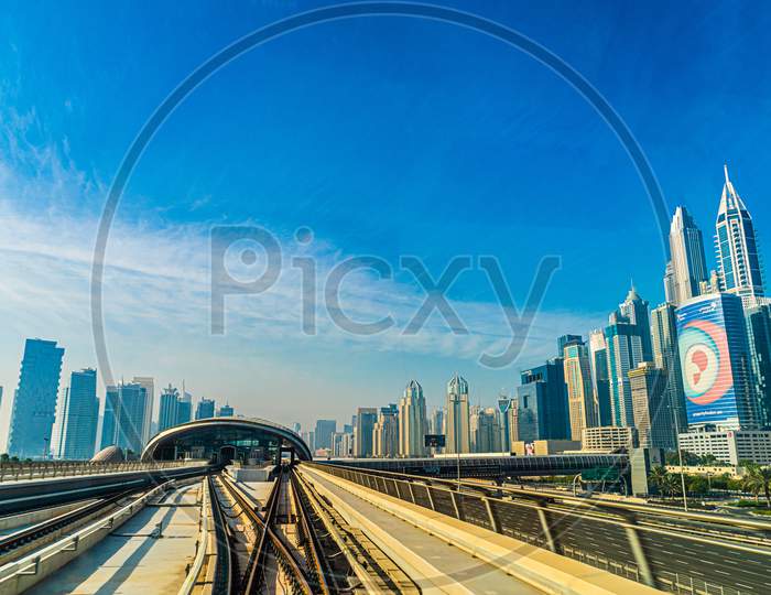 Uae Dubai Skyline Visible From The Dubai Metro