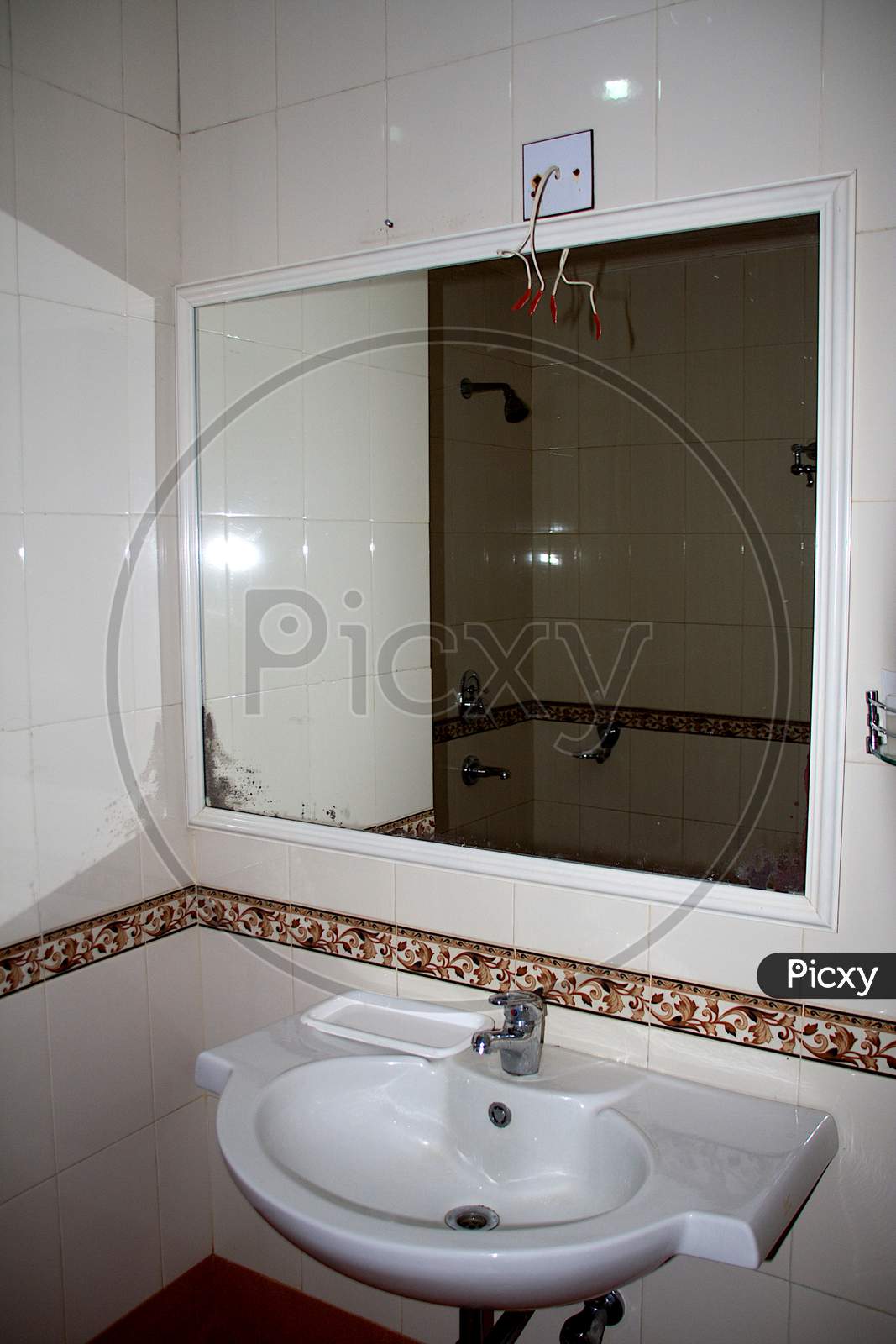 Wash Basin And Mirror In Wash-Room