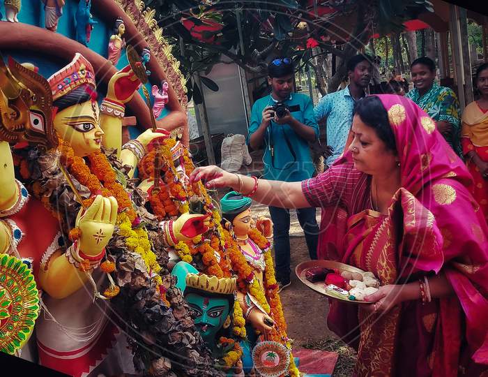 Kolkata, West Bengal, India - 15 October 2021:Subho Bijoya. The Last Day Of Durga Puja Festival, Bidding Farewell To Goddess Durga With Sindoor(Vermilion) And Pan (Betel Nut) Leaves.