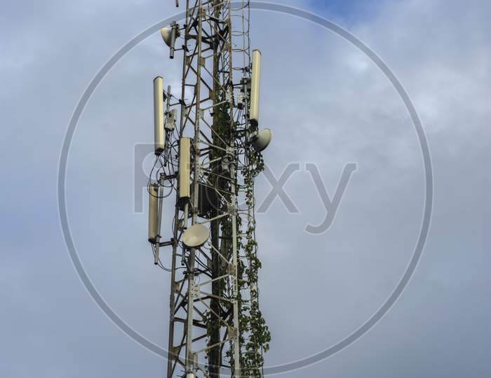 Mobile Telecommunication Tower Antenna And Satellite Dish With Electronic Communications Equipments.