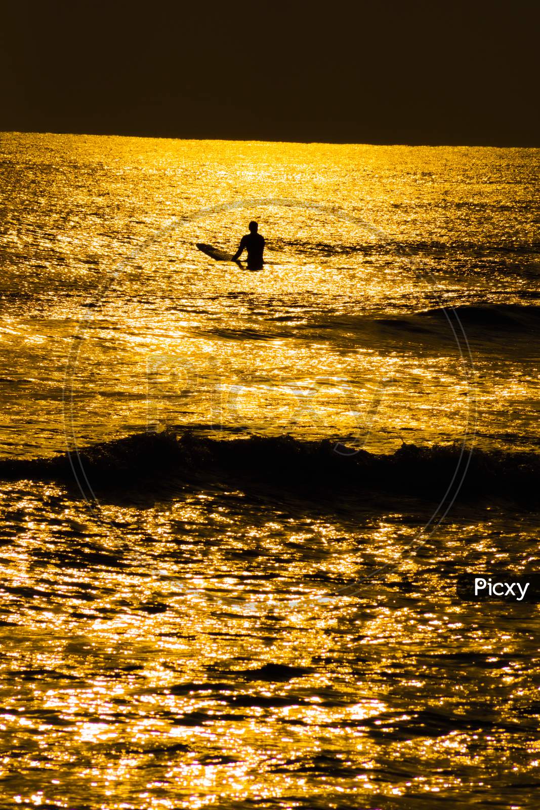 Surfer Silhouette And Dusk Of Kamakura Coast
