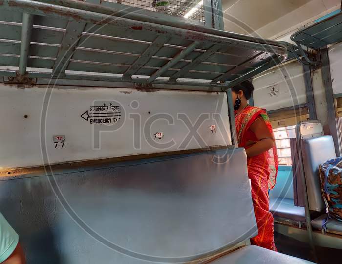 Picture of inside of a express train in India. Selective focus.