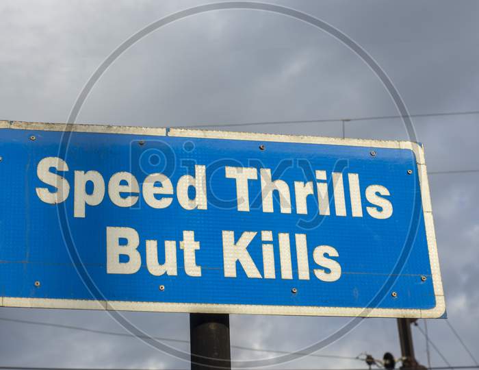 Road Side Sign Of Speed Thrills But Kills
