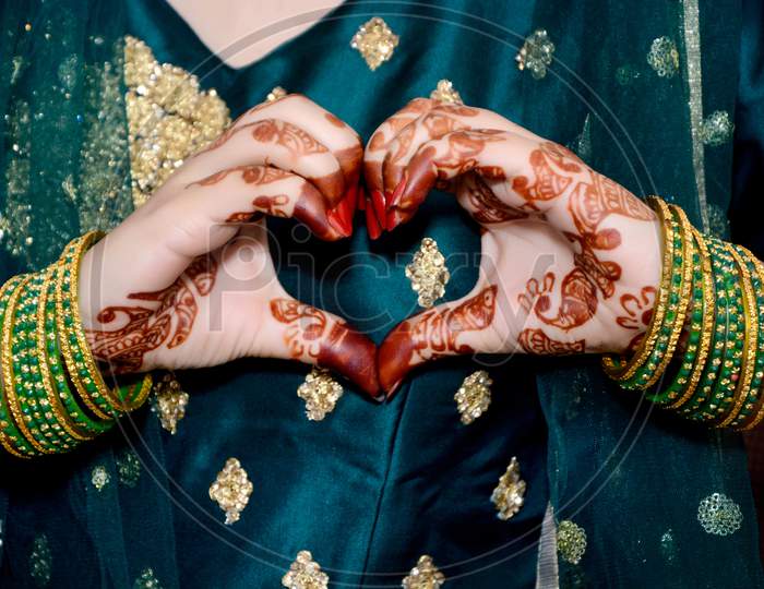 Indian Bride Making Heart Shape By Her Hands.