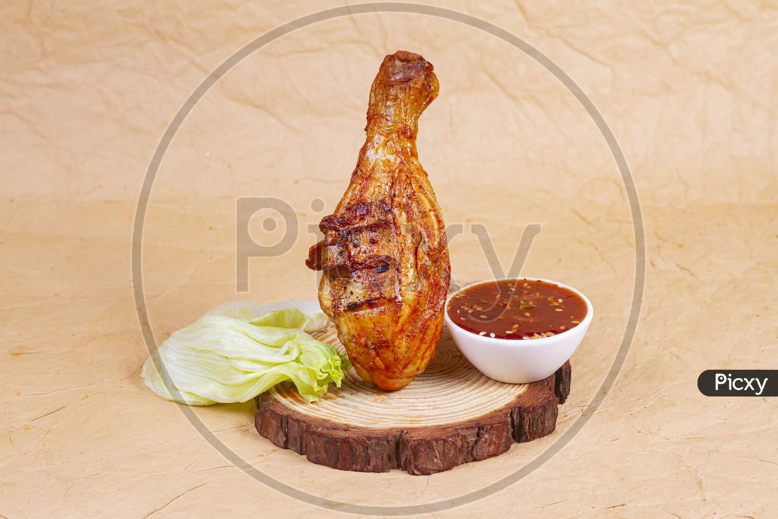 Hot And Crispy Grilled Chicken Legs Isolated On A Wooden Wooden Platter