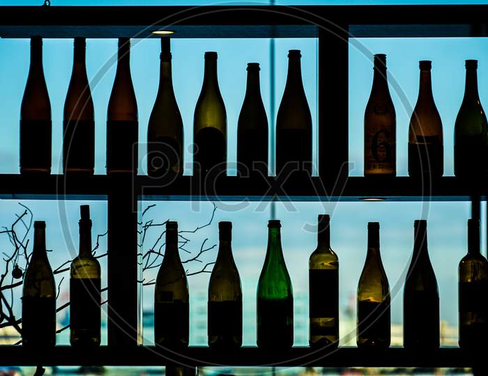 Silhouette Of Many Wine Bottles