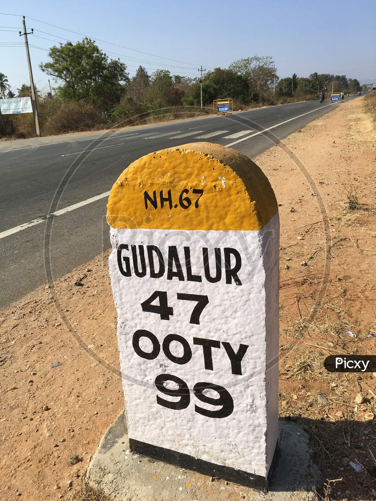 Mile stone 99 kilometers to Ooty, Tamil Nadu