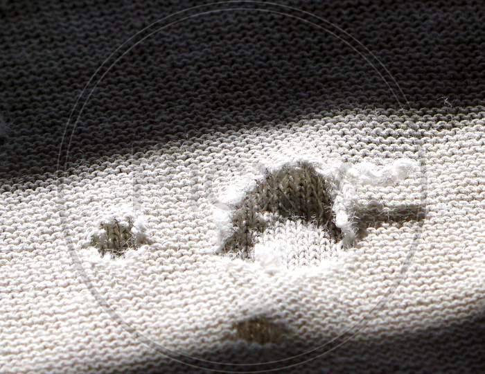 View Of Textile Material And Texture With Holes In Sunlight