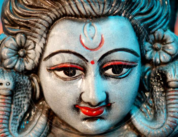 Indian Hindu God Shiva idol With Snake Hung On The Neck As In Mythology