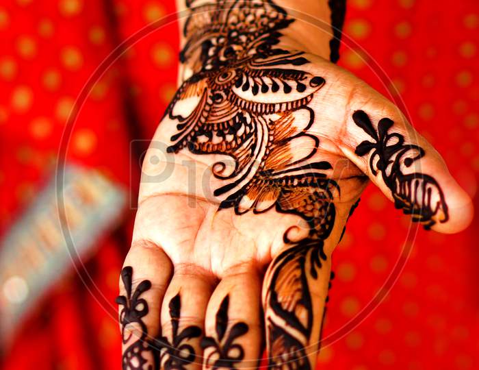 Indian Henna Or Herbal Way Of Traditional Temporary Tattooing On A Womans Hand