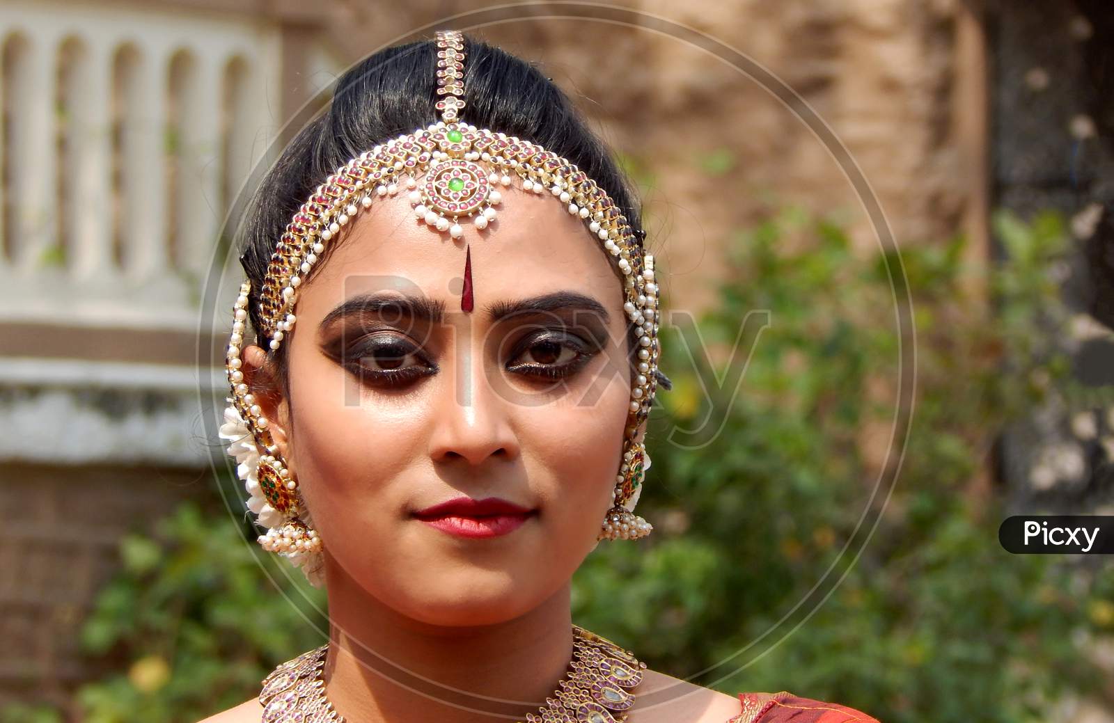 Portrait Of Indian Woman Dancer In Bharatanatyam Makeup