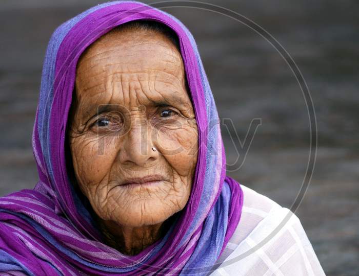Portrait Of Indian Old Fwoman, With Traditional Dresss