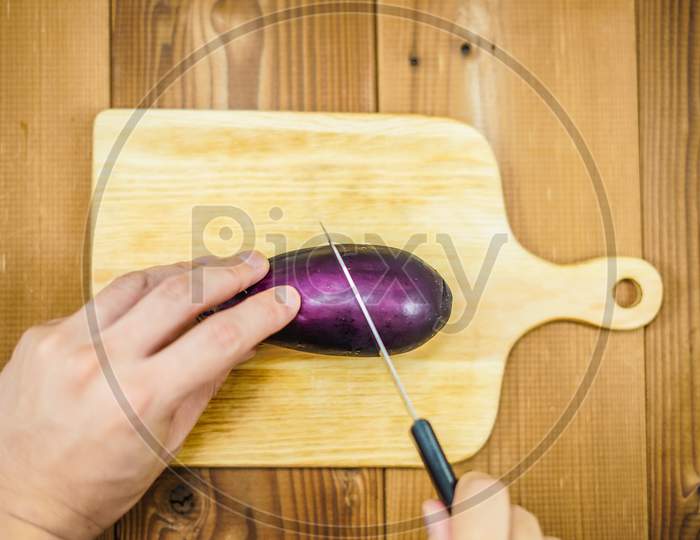 Image To Cut The Eggplant In A Cutting Board