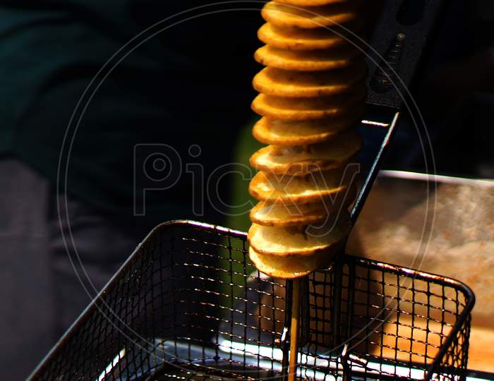 View Of Making Indian Street Food Twisted Or Spiral Or Tornado Photo Chips