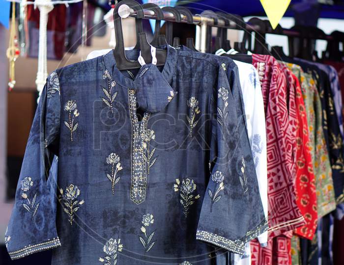 Ndian Woman Fashion And Tradition Wear Salwar Kameez Hung In Shop Display