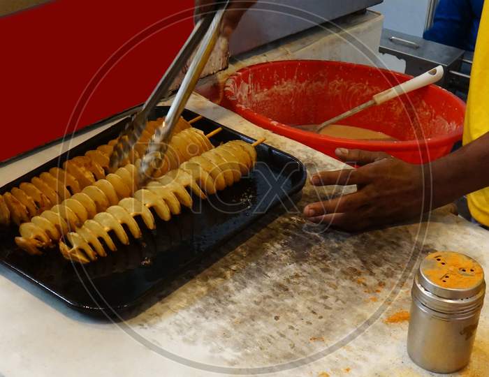 Indian Street Food Vendor Making Twisted Or Tornado Potato Chips