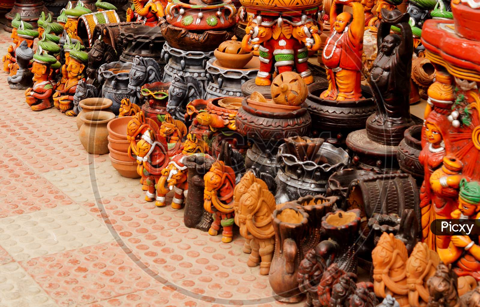 Indian Handicraft Earthen Mud Objects In Display, Outdoors ,On The Footpath Of A Market Place By Potter