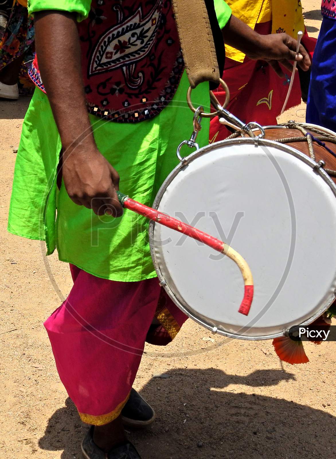 Ndian Hindu Man Playing Drum  During Religious Celebration