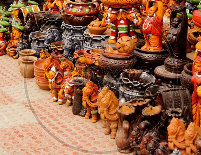 Indian Handicraft Earthen Mud Objects In Display, Outdoors ,On The Footpath Of A Market Place By Potter