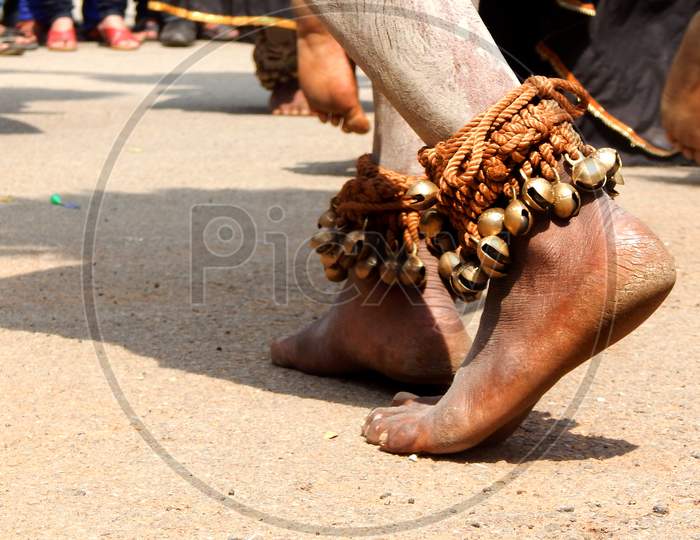 View Of Legs With Bells Tied Of Indian Tribal Dancer Performing