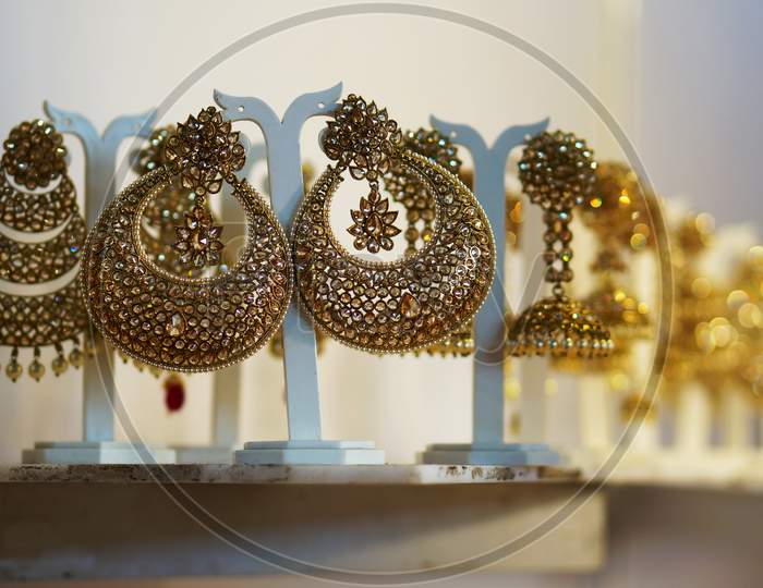 Indian Woman Artificial Or Imitation Jewlry Ear Hangings In Shop Display