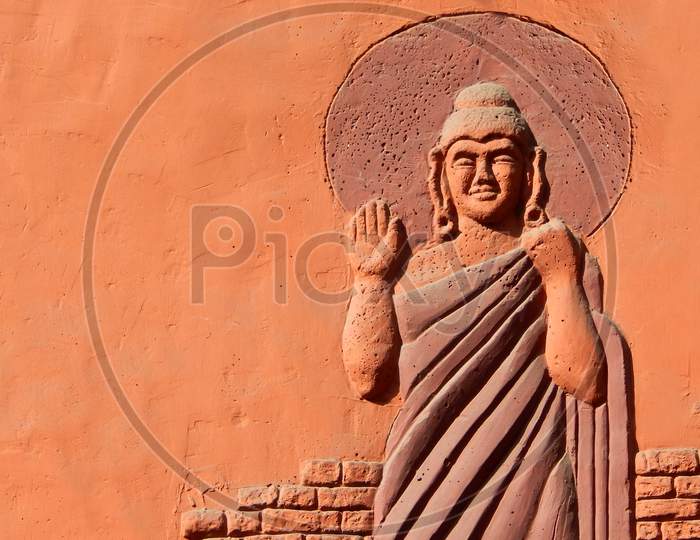 View Of Wall Art Of Buddha In Standing And Blessing Pose