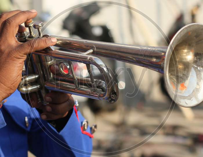 View Of Indian Musician Playing Wind Blowing Trumpet In Outdoors