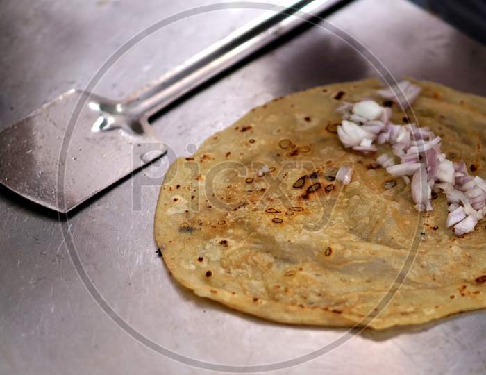 View Of Making Indian Street Food Flat Bread Or Chapathi